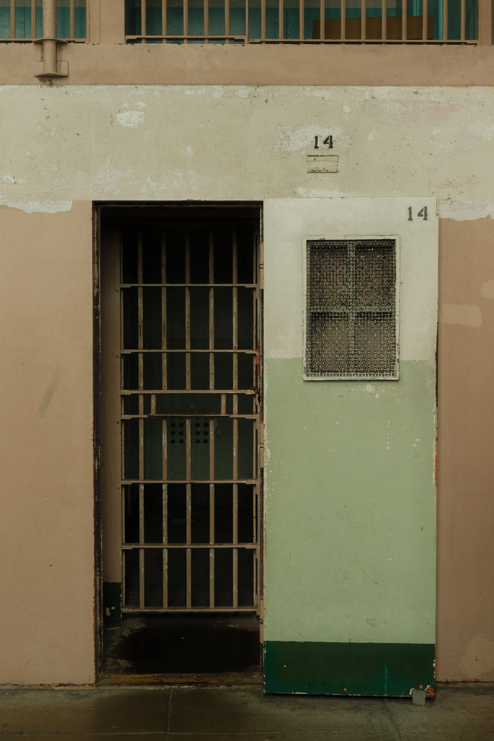 A barred doorway marked fourteen at Alcatraz